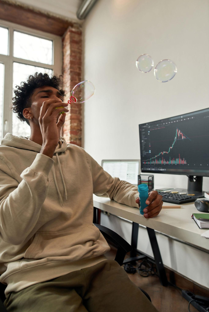 Ethnic millennial male trader relax earning online